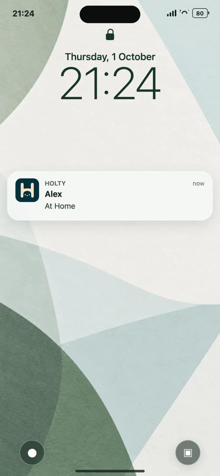 Synthetic iPhone lock screen showing a Holty notification that Alex is At Home