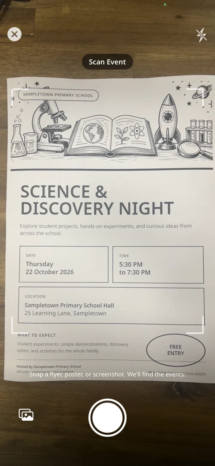 Holty event scanner framing a printed school Science and Discovery Night flyer